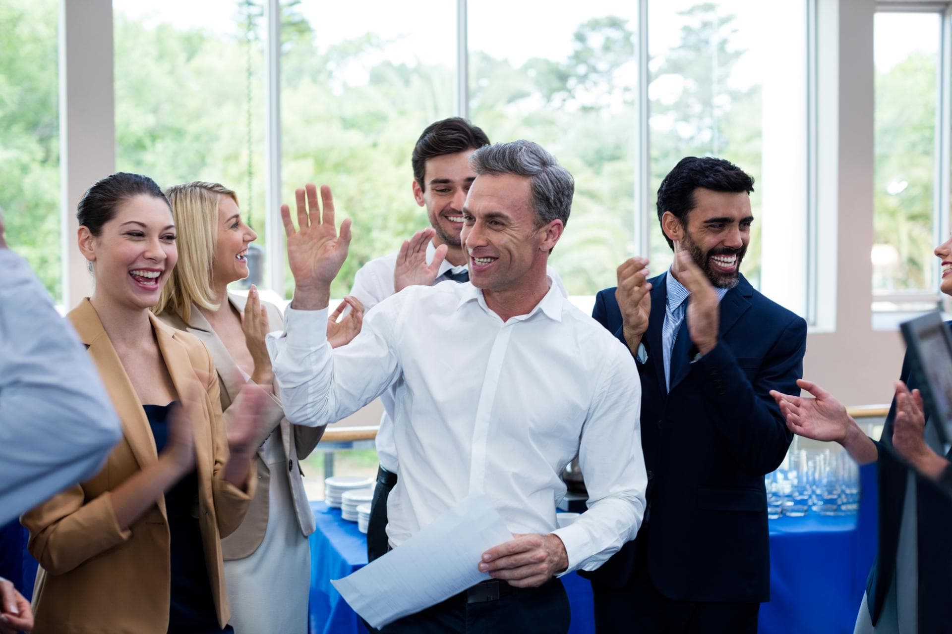 happy-business-executives-giving-high-five-2025-04-03-04-46-40-utc